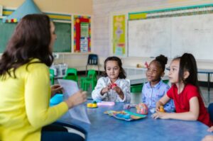 ADHD NY children in listening to a teacher